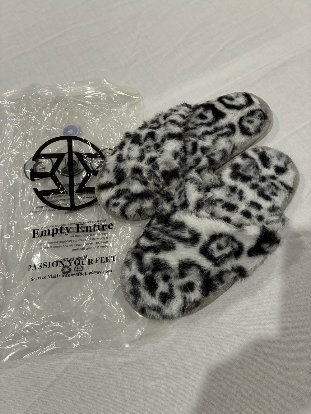 Faux Fur Slide Slippers in Black & White Leopard Print -